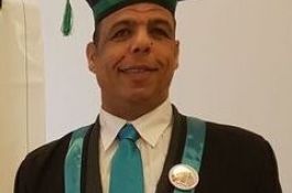 الأستاذ حسن العاصي
